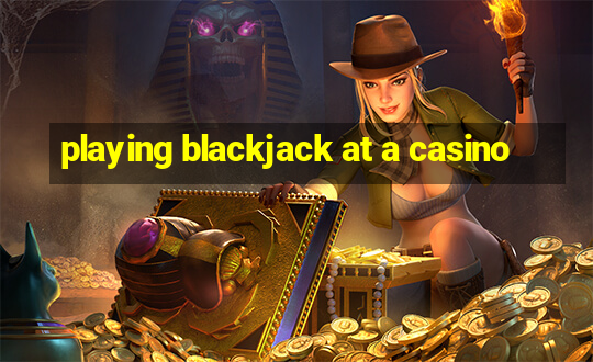 playing blackjack at a casino